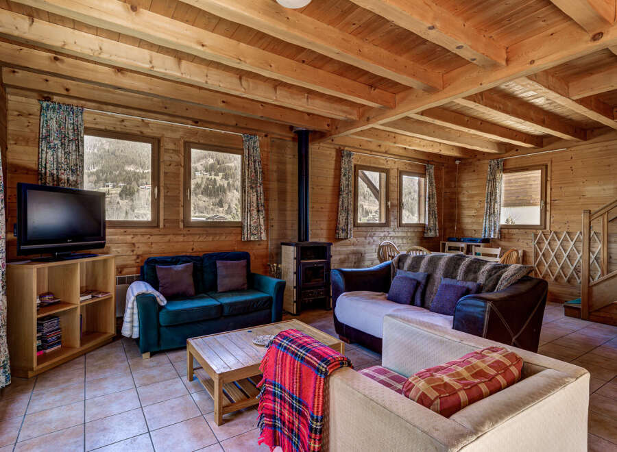 Cozy cabin living at its finest! This charming space features a warm wooden interior, perfect for a relaxing getaway.