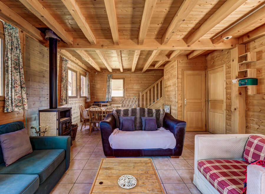 Step into a cozy cabin retreat with stunning wooden interiors.