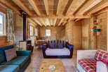 Step into a cozy cabin retreat with stunning wooden interiors.