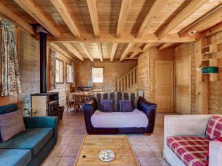 Step into a cozy cabin retreat with stunning wooden interiors.
