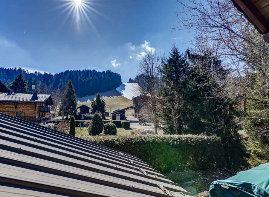 Enjoy breathtaking mountain views from this charming property.
