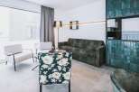 Step into a world of modern elegance with this stylish living space.