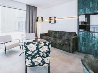 Step into a world of modern elegance with this stylish living space.