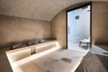 Indulge in tranquility within this luxurious spa, featuring a meticulously designed steam room.