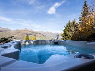 Luxury mountain getaway with stunning views and a private hot tub.