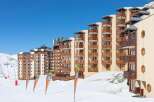 Discover the charm of this ski-in/ski-out property, offering stunning mountain views and direct access to the slopes.
