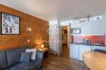 Cozy apartment with a modern kitchen and a comfortable living area.