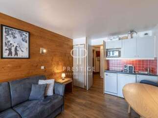 Cozy apartment with a modern kitchen and a comfortable living area.