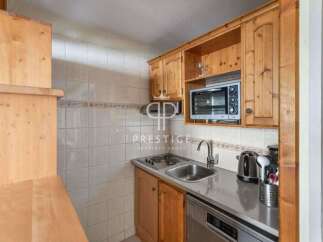Discover a charming kitchen space, perfect for preparing meals.