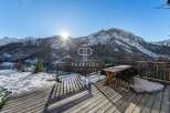 Experience breathtaking mountain views from this stunning property.