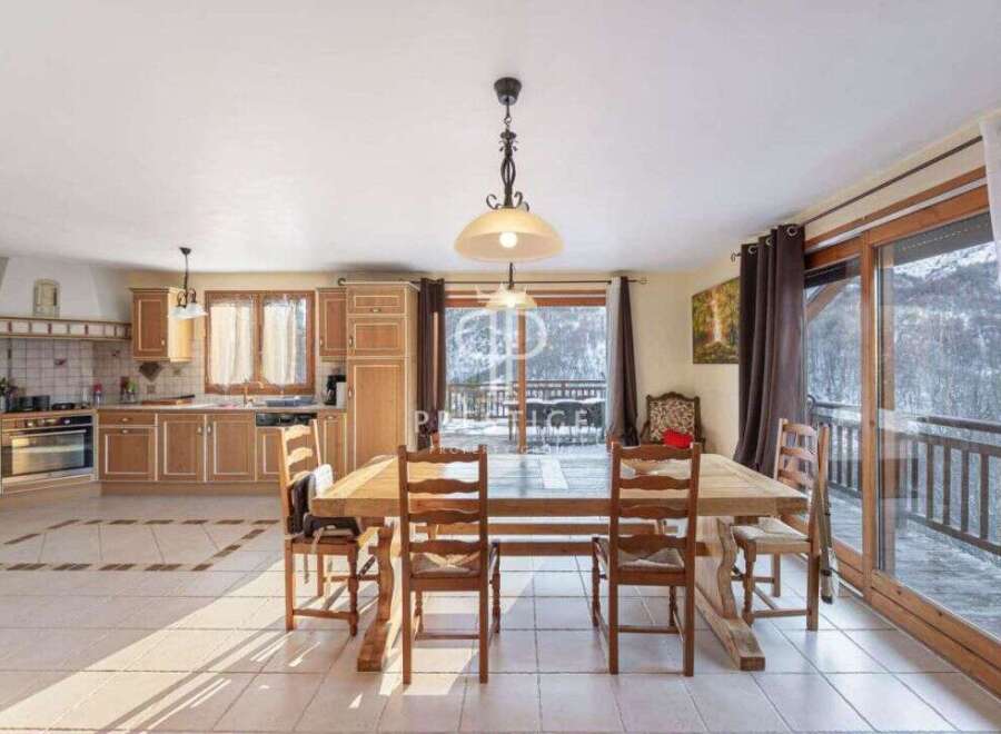 Discover the charm of this stunning property, featuring a spacious dining area perfect for gatherings.