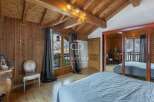 Discover the charm of this stunning property, featuring exquisite wooden interiors and a cozy ambiance.