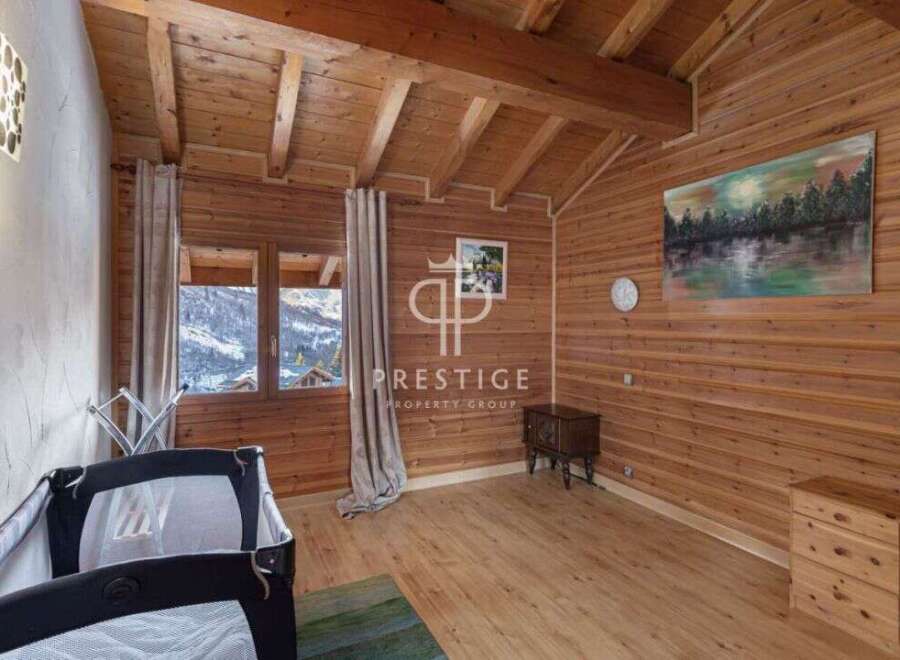 Experience the charm of this cozy wooden chalet, perfect for a mountain getaway.