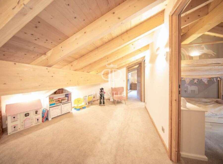Discover the charm of this unique property, featuring a cozy loft space perfect for a children's playroom or a creative retreat.