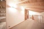 Discover the charm of this stunning property, featuring a beautifully designed interior with exposed wooden beams and a cozy ambiance.