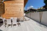 Enjoy outdoor dining on the spacious patio, perfect for entertaining.