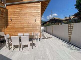 Enjoy outdoor dining on the spacious patio, perfect for entertaining.
