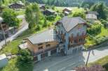 Discover a stunning property nestled in a picturesque mountain setting.