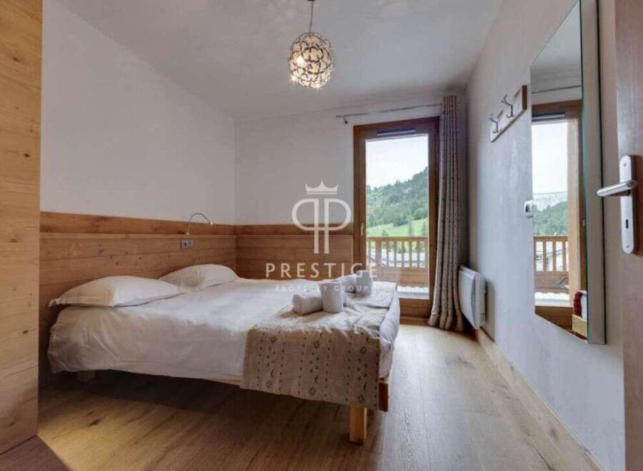 Discover a cozy bedroom with a stunning view.