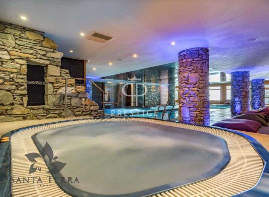Indulge in luxury at this stunning property featuring a private spa.