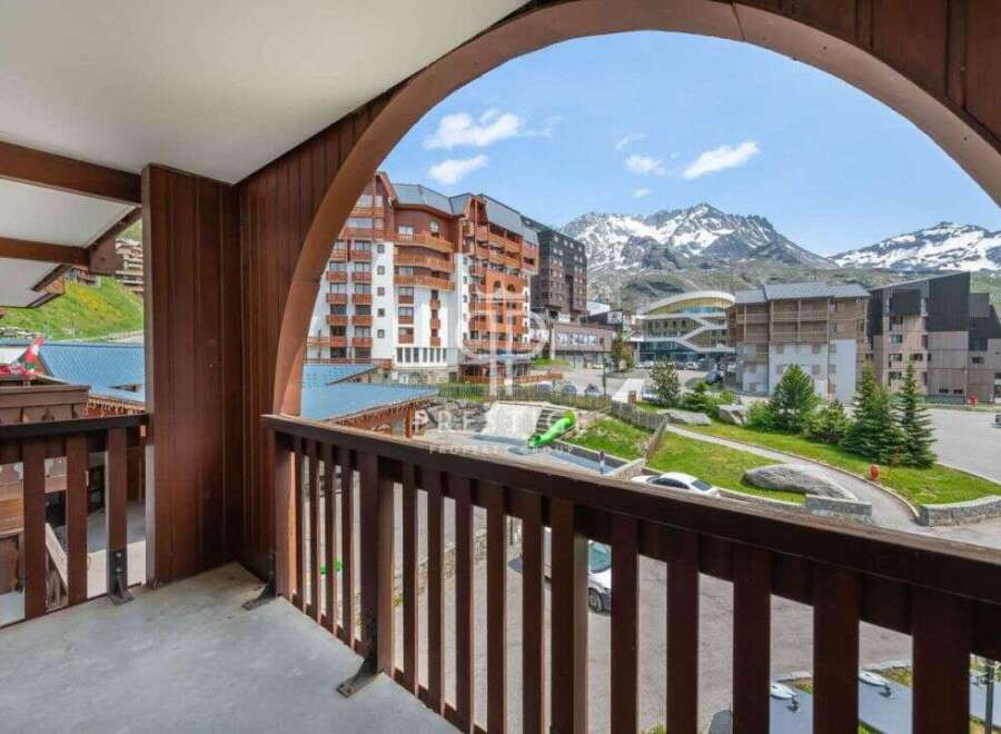 Enjoy breathtaking mountain views from this charming balcony.