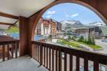 Enjoy breathtaking mountain views from this charming balcony.