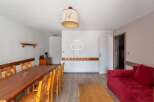 Discover a charming property with a cozy dining area, perfect for gatherings.