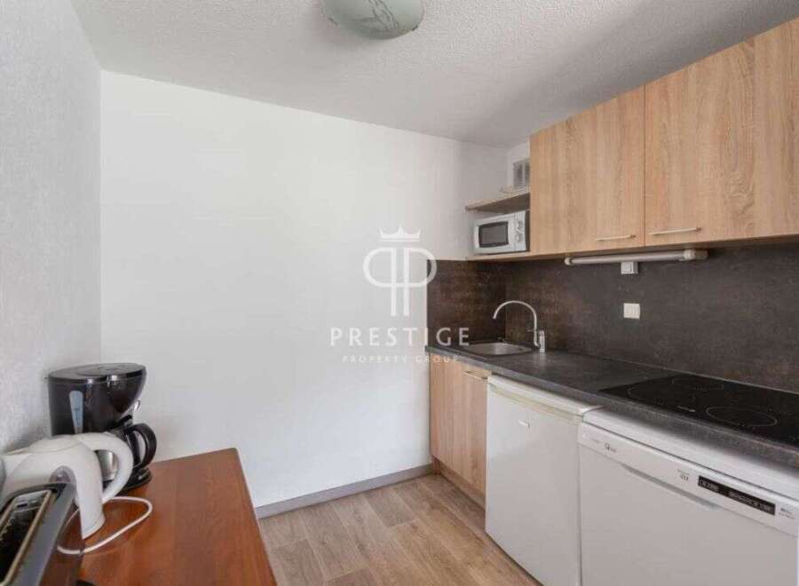 Discover a cozy kitchen space, perfect for preparing meals.