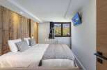 Experience luxury in this stunning bedroom.