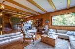 Experience the warmth of this stunning property, featuring exquisite wooden interiors and a cozy ambiance.
