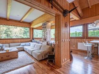 Experience the warmth of this stunning wooden chalet, perfect for a cozy retreat.