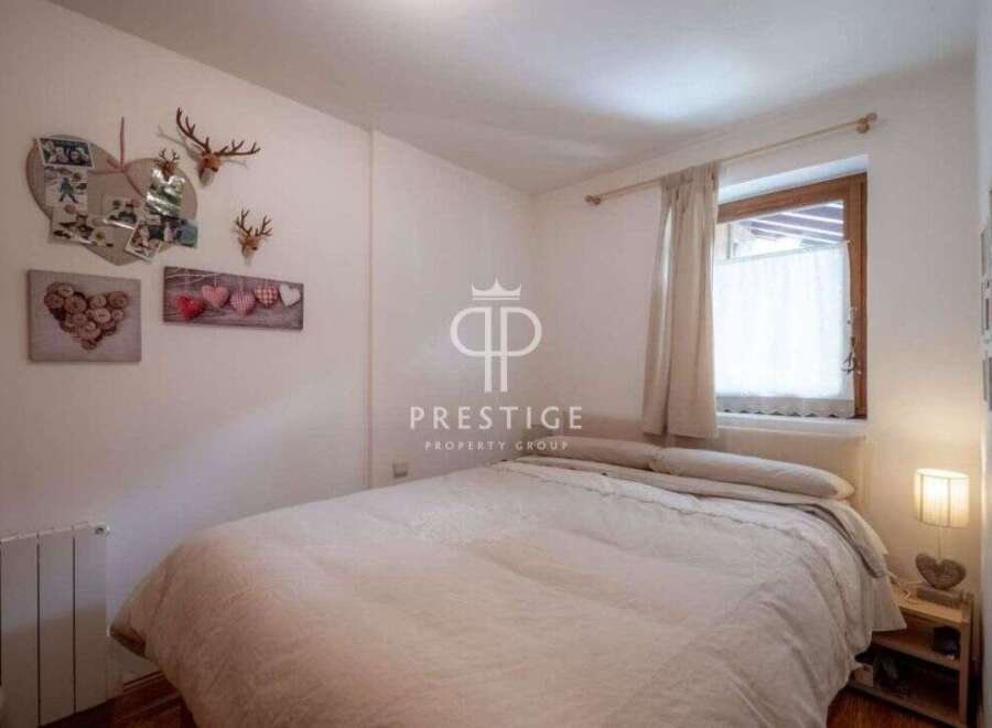 Cozy bedroom with charming decor.
