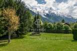 Discover a stunning property nestled amidst breathtaking mountain views.