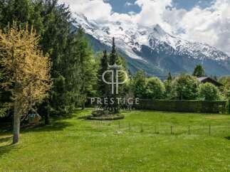 Discover a stunning property nestled amidst breathtaking mountain views.