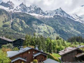 Discover a luxurious chalet nestled in the heart of the French Alps, offering breathtaking mountain views.