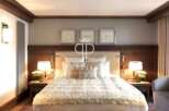 Experience luxury in this stunning bedroom.