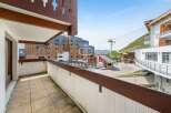 Enjoy breathtaking mountain views from this stunning balcony.