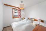 Discover a cozy bedroom with a charming ambiance.