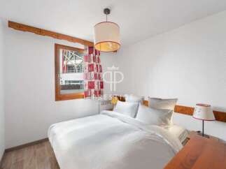 Discover a cozy bedroom with a charming ambiance.