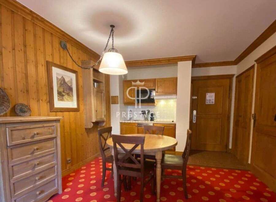 Cozy and inviting, this property features a charming dining area perfect for intimate gatherings.