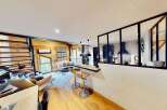 Discover this stunning property featuring a modern kitchen with sleek black accents and a stylish breakfast bar.