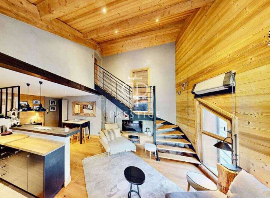 Discover the charm of this stunning property, featuring a unique wooden interior and a modern design.