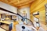 Discover the charm of this stunning property, featuring a unique wooden interior and a modern design.