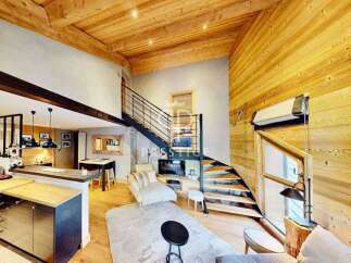 Discover the charm of this stunning property, featuring a unique wooden interior and a modern design.