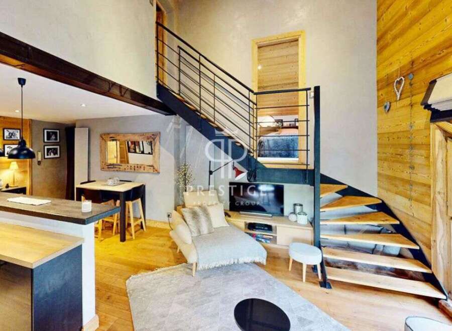 Discover a stunning property featuring a modern interior with a unique staircase design.