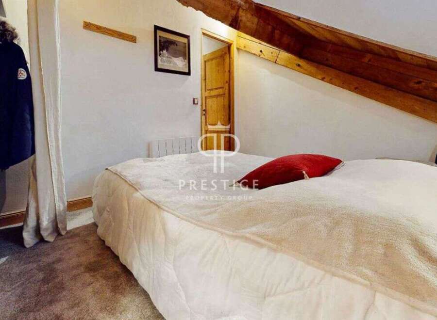 Discover a cozy bedroom with a unique architectural design.