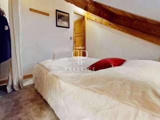 Discover a cozy bedroom with a unique architectural design.