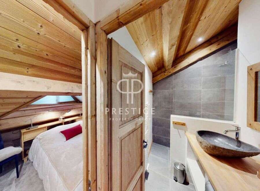 Discover the charm of this unique property, featuring stunning wooden accents throughout.
