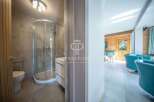 Discover luxury living in this stunning property! Featuring a modern bathroom with a sleek shower and elegant finishes.