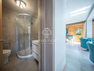Discover luxury living in this stunning property! Featuring a modern bathroom with a sleek shower and elegant finishes.